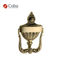 Bronces Coba 1084 Door Knocker in P.O.V Finish, made in Spain, featuring intricate detailing and solid brass construction.