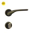 Khas Triumph Plus A65-1622 door handle set with rosette in oil-rubbed bronze finish, featuring golden accents and a curved, ridged design for a vintage look.