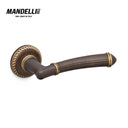 Mandelli 1511 Aurora door handle in matt bronze finish, featuring a classical design and crafted from durable solid brass.