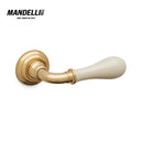 Mandelli 641 Doge door handle in polished brass/ceramic, exemplifying luxury and craftsmanship, ideal for enhancing home interiors.