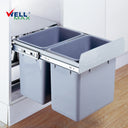 Wellmax CLG025A silver grey double slide garbage bin system, showing two large plastic buckets in a pull-out metal frame mounted inside a kitchen cabinet.