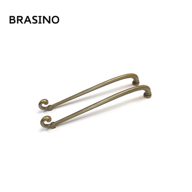 Brasino HK 938-1 Door Pull Handle Set in Oil Bronze finish, crafted from 100% brass with an elongated, elegant curved design.