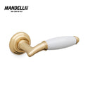 Mandelli 1201 Melody door handle in polished brass and white ceramic, symbolizing the harmony of Italian design and craftsmanship.