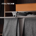 Referencing TOP MOUNTED TROUSER RACK 1.jpg, the top-mounted rack is extended from under a closet shelf, displaying neatly hung grey trousers. TOP MOUNTED TROUSER RACK 2.jpg provides a close-up of the front pull handle and the textured hanging rods. TOP MOUNTED TROUSER RACK 3.jpg offers a macro view of the metal hooks and the non-slip covering on the trouser bars. TOP MOUNTED TROUSER RACK 4.jpg shows an isolated view of the complete rack assembly with 20 individual hanger arms. TOP MOUNTED TROUSER RACK.jpg d