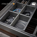"Referencing Trousers Rack & jewelry box 1.jpg, a detailed cross-section graphic highlights the internal mechanisms of the silent damping guide rail. Trousers Rack & jewelry box 2.jpg provides a close-up of the grey movable anti-slip trouser rods secured with ABS buckles, holding dark fabric. Trousers Rack & jewelry box 3.jpg shows a close-up of the jewelry box section, organizing bracelets, a watch, and perfume bottles within its grey compartments. Trousers Rack & jewelry box 4.jpg displays the empty pull-