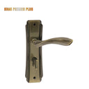 Khas Premeo Plus 5812-03 door handle set in antique brass finish with curved design and ergonomic grip.