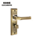 Khas Exclusive 5827-197 door handle set in antique brass and chrome finish with a sleek faceted design.