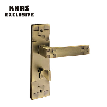 Khas Exclusive 5827-49 door handle set in antique brass finish with bold geometric design and ergonomic handle.