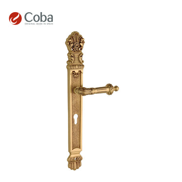 Bronces Coba 630 Handle Set in Old Antique Brass Finish, made in Spain, featuring an ornate design with handle and plate.