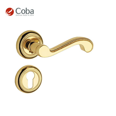 Bronces Coba 950-G Handle Set with Rosettes and Key Hole Escutcheon in Gold Plated Finish, made in Spain, featuring a stylish and detailed design.