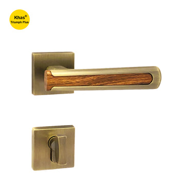Khas Triumph Plus A14-1686 door handle set with rosette in Matt Antique Brass and wood finish, featuring a modern-rustic design and wood insert grip.