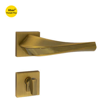 Khas Triumph Plus A14-1717 door handle set with rosette in matt antique brass and antique brass finish, featuring an ergonomic design with a sleek aesthetic.