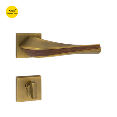 Khas Triumph Plus A14-1717 door handle set with rosette in matt antique brass finish and wood inlay, featuring a sleek design and ergonomic grip.