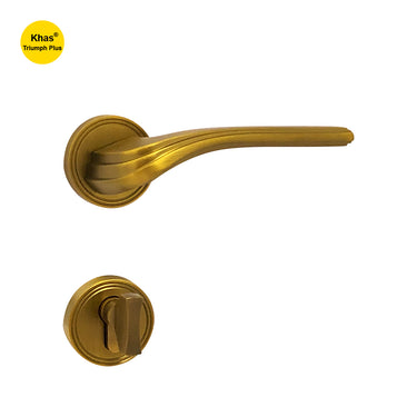 Khas Triumph Plus A65-1622 door handle set with rosette in matt antique brass finish, featuring a curved and ridged design for a classic look.