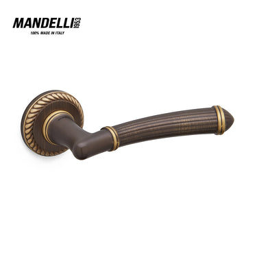 Mandelli 1511 Aurora door handle in matt bronze finish, featuring a classical design and crafted from durable solid brass.