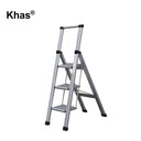 Referencing Anti-Slip Household Ladders 1.jpg, a sleek 3-step aluminum household ladder featuring black anti-slip treads and an ergonomic top handle is displayed against a plain white background. Anti-Slip Household Ladders.jpg showcases the stylish aluminum ladder deployed in a bright, modern home hallway next to an organized storage room, ready for household use.