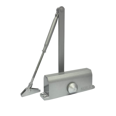 Maxell B70 surface-mounted door closer in a silver finish, displaying the main body with an embossed Maxell logo and a jointed arm assembly.