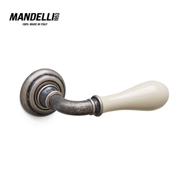 Mandelli 641 Doge door handle, featuring an elegant antique chrome finish with a smooth ceramic grip, crafted in Italy.