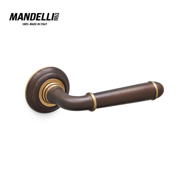 Mandelli 1341 Hartù door handle in matt bronze finish, crafted with precision in Italy, showcasing a sleek and modern design.