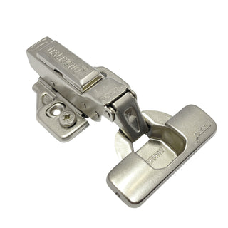 Italtecno half overlay soft close cabinet hinge in a nickel finish, displaying the 35mm cup, 3D adjustment base, and branded arm cover.