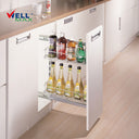 Referencing Jolly basket PTJ009F 1.jpg, a detailed schematic line drawing illustrates the two-tier wire basket structure and its side-mounted sliding tracks. Additionally, Jolly basket PTJ009F.jpg shows the gleaming chrome organizer pulled out from a slim white base cabinet, neatly storing tall bottles of juice, vinegar, and other beverages on its shelves.