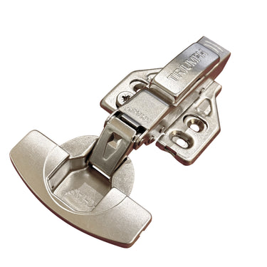 Khas Triumph Plus half overlay cabinet hinge in a nickel finish, displaying the 35mm cup, 3D adjustment base, and a Triumph branded arm cover.