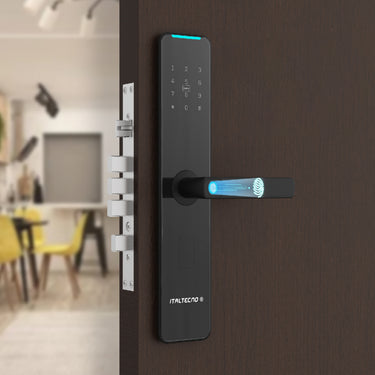 Italtecno KX1 ultra-thin fingerprint smart lock in black, featuring a digital keypad, smart card reader, and fingerprint scanner on the handle.