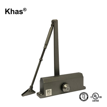 Khas 643-D surface-mounted door closer in a champagne finish, showing the hold-open slide arm mechanism, main body with Khas branding, and the 90-degree hold-open and C-UL-US Listed stamps.