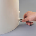 Khas white foot washer basin, featuring an ergonomic, electricity-free design for wudu and daily foot cleaning.