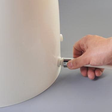 Khas white foot washer basin, featuring an ergonomic, electricity-free design for wudu and daily foot cleaning.