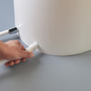Khas white foot washer basin, featuring an ergonomic, electricity-free design for wudu and daily foot cleaning.