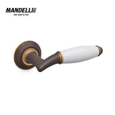 Mandelli 1201 Melody door handle in matt bronze and ceramic, demonstrating refined Italian craftsmanship and luxurious design.
