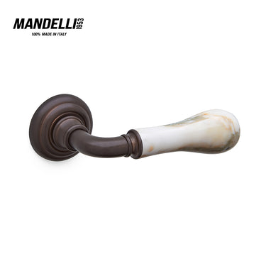 Mandelli 8011 Naxos door handle in antique bronze with White Calacatta marble, showcasing premium Italian craftsmanship and design.