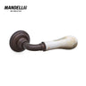 Mandelli 8011 Naxos door handle in antique bronze with White Calacatta marble, showcasing premium Italian craftsmanship and design.