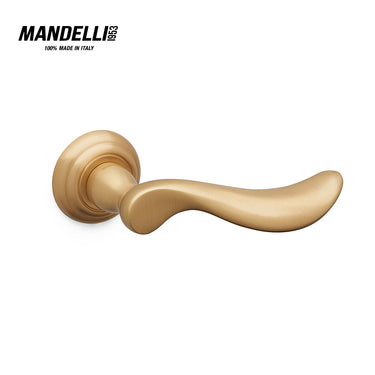 Mandelli 1211 Norma door handle in satin brass, highlighting elegant curves and Italian craftsmanship.