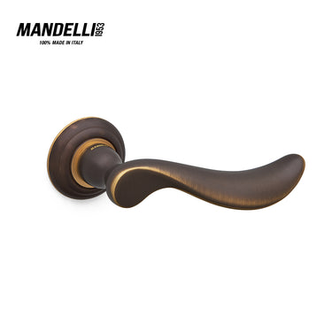 Mandelli 1211 Norma door handle in matt bronze, showcasing sleek design and Italian craftsmanship.
