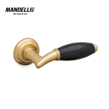 Mandelli 8001 Paros door handle in polished brass/Black Marquinia, showcasing elegant design and Italian craftsmanship.
