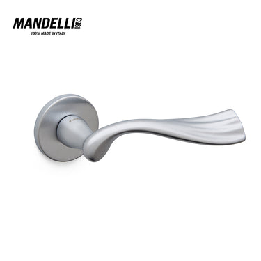Mandelli 1201 River door handle in satin chrome, showcasing an elegant wave design and smooth finish, expertly crafted in Italy.