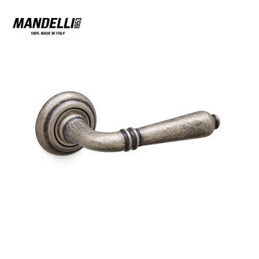 Mandelli 531 Sevilla door handle in Antique Chrome, featuring detailed craftsmanship and a unique finish, crafted in Italy.