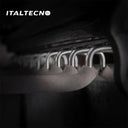 Referencing TOP MOUNTED TROUSER RACK 1.jpg, the top-mounted rack is extended from under a closet shelf, displaying neatly hung grey trousers. TOP MOUNTED TROUSER RACK 2.jpg provides a close-up of the front pull handle and the textured hanging rods. TOP MOUNTED TROUSER RACK 3.jpg offers a macro view of the metal hooks and the non-slip covering on the trouser bars. TOP MOUNTED TROUSER RACK 4.jpg shows an isolated view of the complete rack assembly with 20 individual hanger arms. TOP MOUNTED TROUSER RACK.jpg d