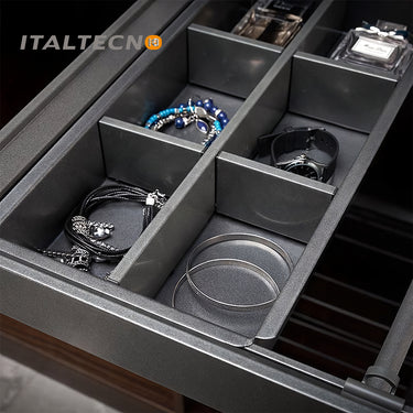 "Referencing Trousers Rack & jewelry box 1.jpg, a detailed cross-section graphic highlights the internal mechanisms of the silent damping guide rail. Trousers Rack & jewelry box 2.jpg provides a close-up of the grey movable anti-slip trouser rods secured with ABS buckles, holding dark fabric. Trousers Rack & jewelry box 3.jpg shows a close-up of the jewelry box section, organizing bracelets, a watch, and perfume bottles within its grey compartments. Trousers Rack & jewelry box 4.jpg displays the empty pull-