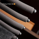 Referencing V Shape pants rack 1.jpg, a grey top-mounted L-shape pants rack is pulled out in a dark wardrobe, holding a pair of dark grey trousers. V Shape pants rack 2.jpg shows a close-up of the cold-rolled steel hooks and the soft cylinder flocking sponge tubes. V Shape pants rack 3.jpg provides a macro view of the textured non-slip flocking sponge tubes with metal end caps. V Shape pants rack 4.jpg illustrates the internal damping buffer guide rail mechanism for smooth sliding. V Shape pants rack 5.jpg 