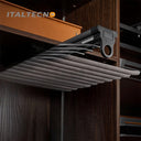 Referencing V Shape pants rack 1.jpg, a grey top-mounted L-shape pants rack is pulled out in a dark wardrobe, holding a pair of dark grey trousers. V Shape pants rack 2.jpg shows a close-up of the cold-rolled steel hooks and the soft cylinder flocking sponge tubes. V Shape pants rack 3.jpg provides a macro view of the textured non-slip flocking sponge tubes with metal end caps. V Shape pants rack 4.jpg illustrates the internal damping buffer guide rail mechanism for smooth sliding. V Shape pants rack 5.jpg 